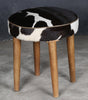 SHORT COWHIDE STOOL Philbee Interiors 