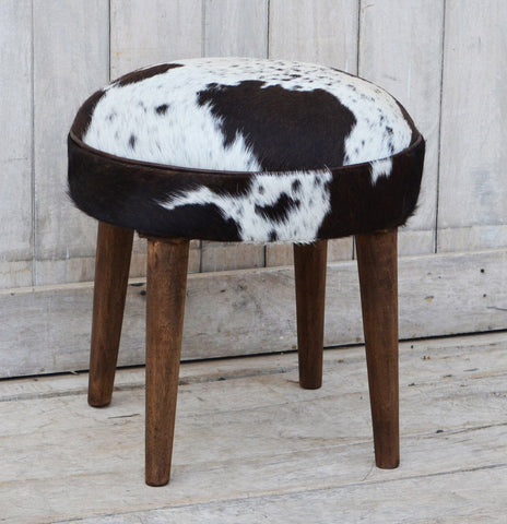 SHORT COWHIDE STOOL Philbee Interiors 