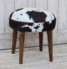 SHORT COWHIDE STOOL Philbee Interiors 